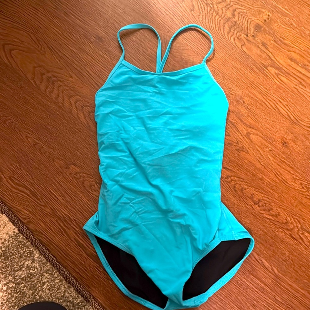 Jolyn Belle one piece onsie. Size 30 in an aqua color. Tie back. Worn once
